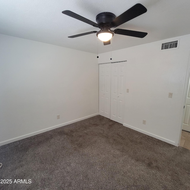 3645 N 69th Ave Unit 99, Phoenix, AZ 85033 - unfurnished bedroom with carpet floors, a closet, and ceiling fan