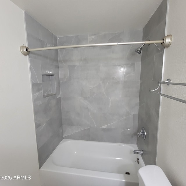3645 N 69th Ave Unit 99, Phoenix, AZ 85033 - bathroom featuring toilet and shower / tub combination