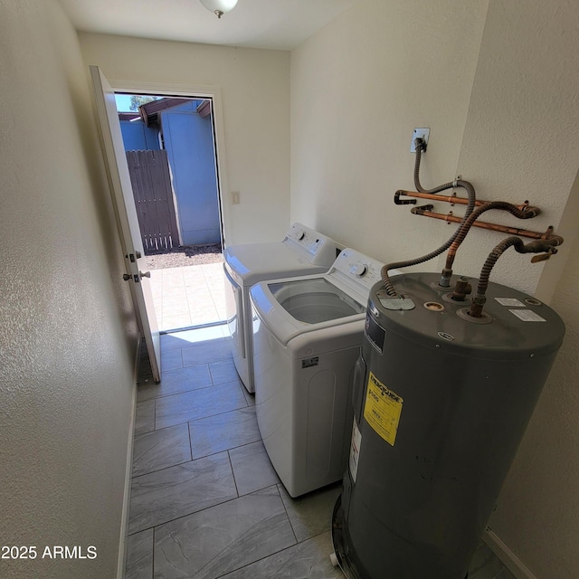 3645 N 69th Ave Unit 99, Phoenix, AZ 85033 - laundry area with water heater, separate washer and dryer, light marble finish floors, and a textured wall