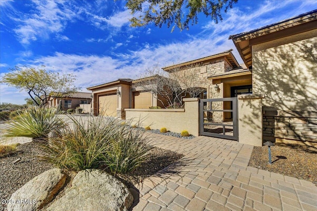 doorway to property featuring a garage