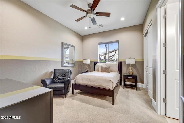 carpeted bedroom featuring ceiling fan