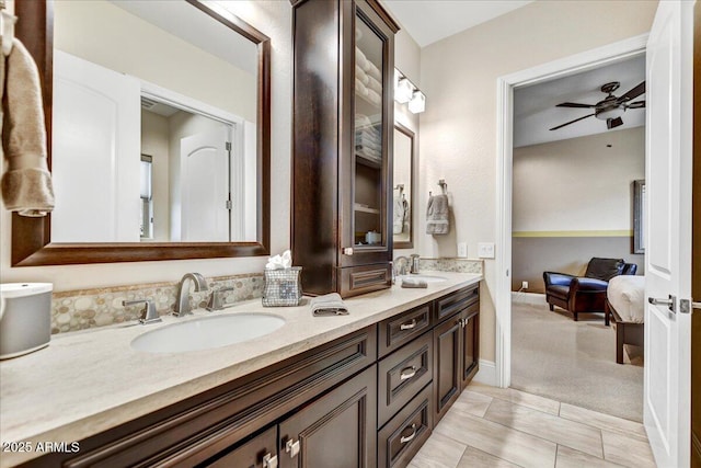 bathroom with vanity and ceiling fan