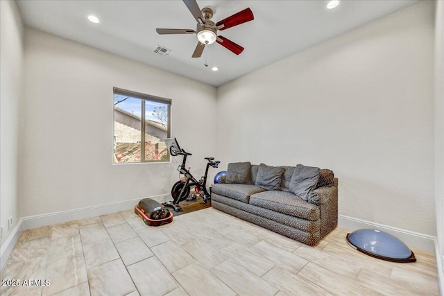 exercise room featuring ceiling fan