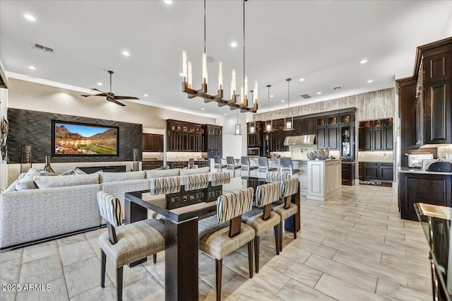 dining space with ceiling fan