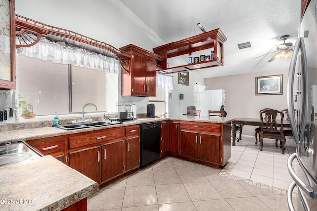 kitchen with ceiling fan, black dishwasher, light tile patterned flooring, a textured ceiling, and sink