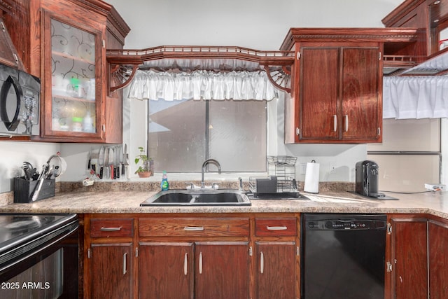 kitchen with sink and black appliances