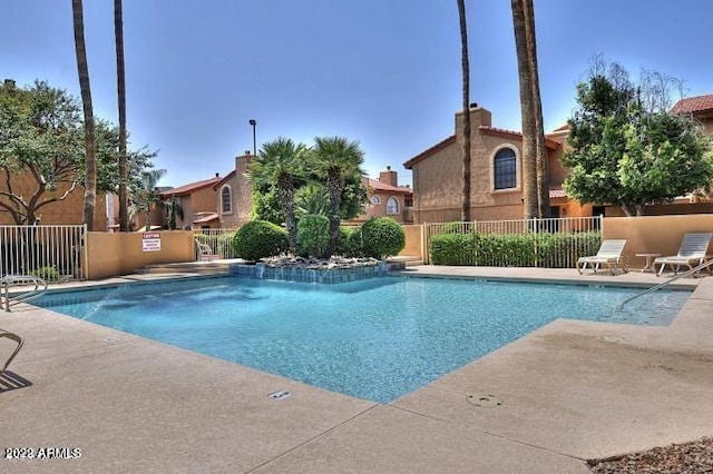 view of pool featuring a patio area