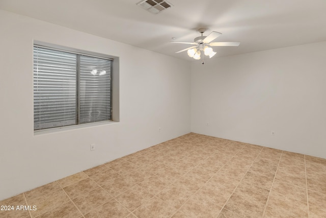 spare room featuring ceiling fan