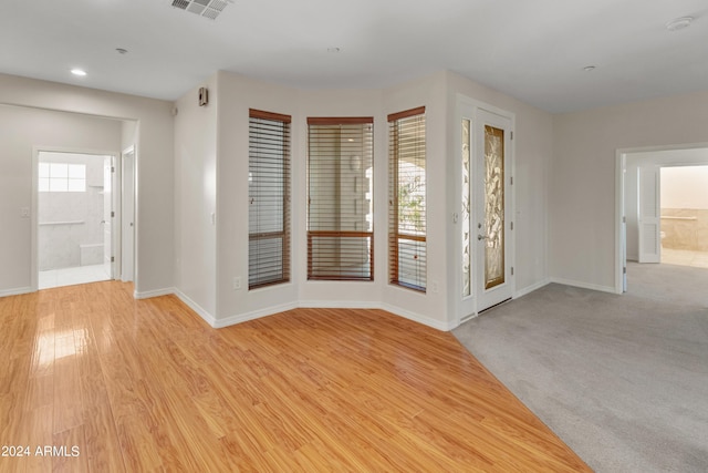 empty room featuring light hardwood / wood-style floors