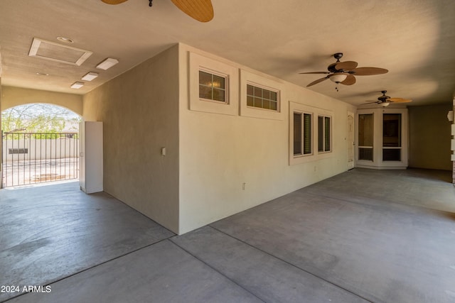 view of patio featuring ceiling fan