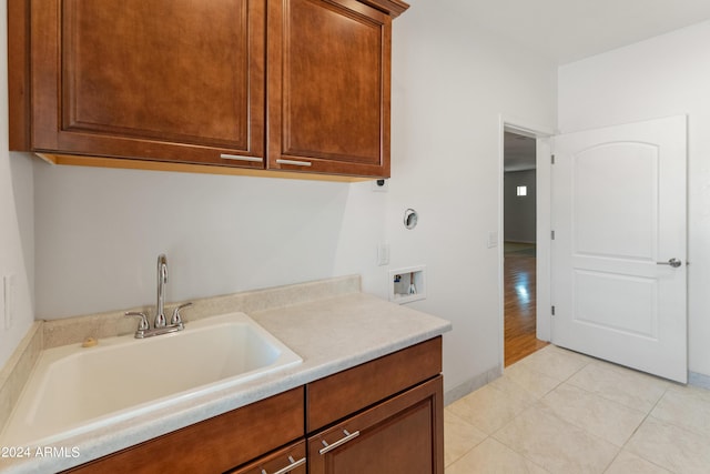 bathroom with tile patterned floors and sink