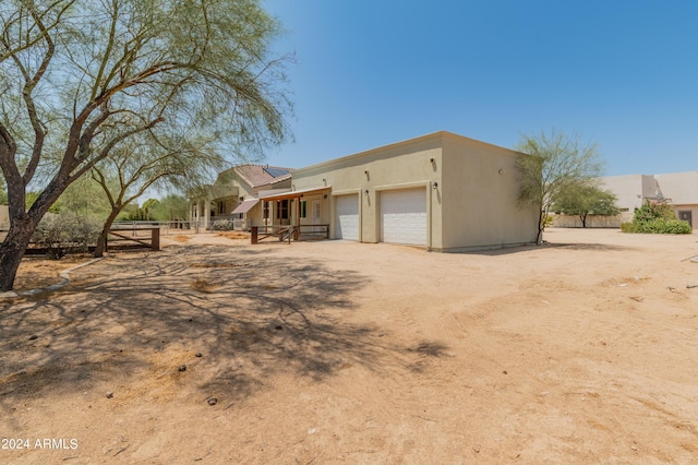 view of front of home with a garage