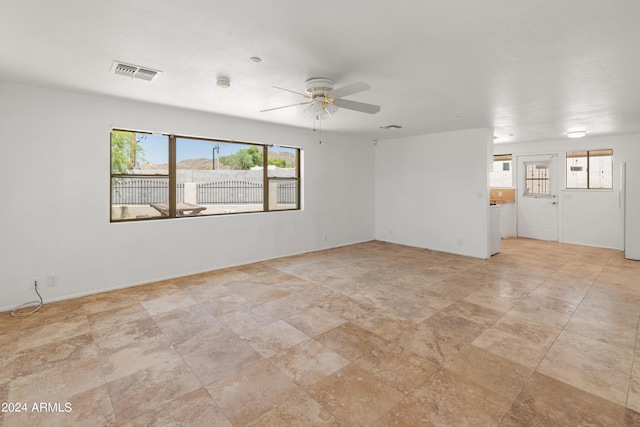 empty room featuring ceiling fan