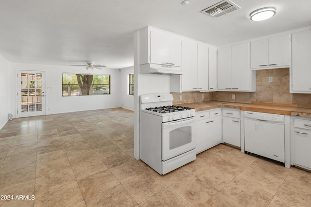 kitchen featuring ceiling fan, white appliances, tasteful backsplash, and white cabinets