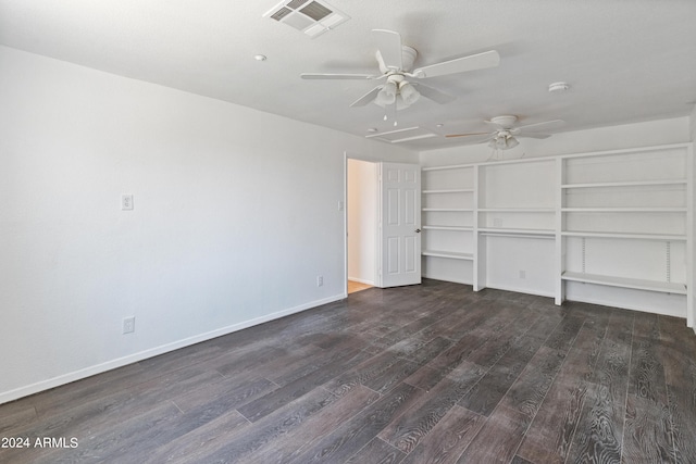 interior space featuring dark wood-type flooring and ceiling fan