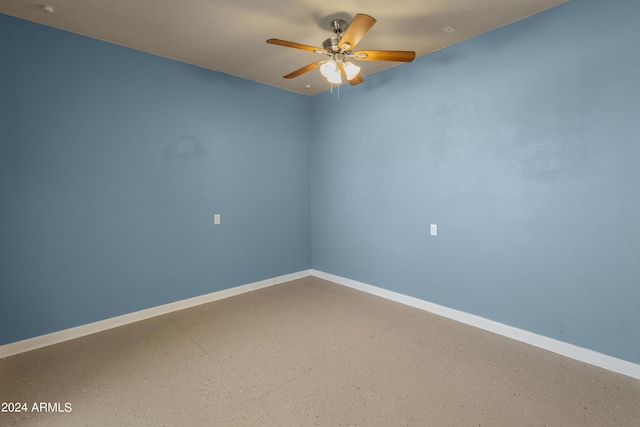 unfurnished room with ceiling fan