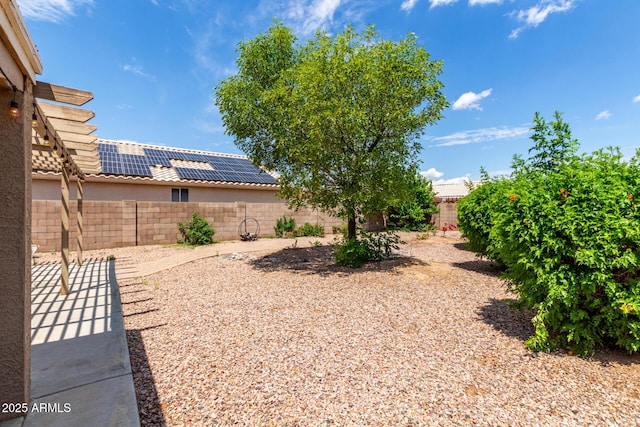 fenced backyard featuring a patio