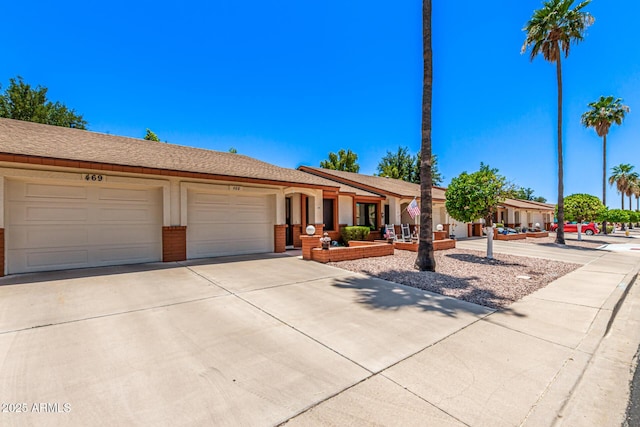 2105 S Zinnia Ave Unit 468, Mesa, AZ 85209 - ranch-style home with a garage, driveway, and brick siding