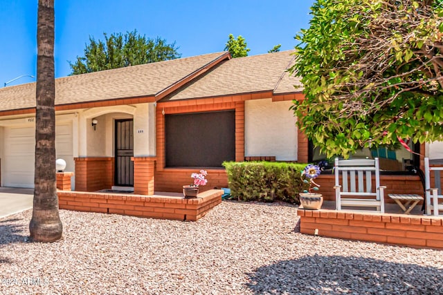 2105 S Zinnia Ave Unit 468, Mesa, AZ 85209 - ranch-style house with roof with shingles, a garage, and a porch