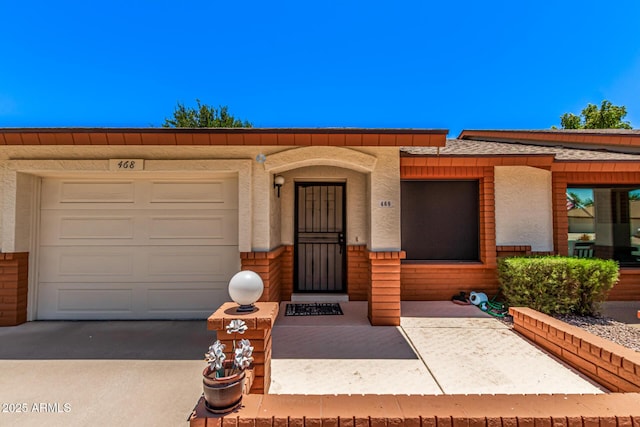 2105 S Zinnia Ave Unit 468, Mesa, AZ 85209 - view of front of house with an attached garage and concrete driveway