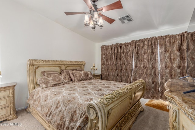 bedroom featuring light carpet and ceiling fan