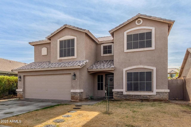 view of front facade with a garage and a front lawn