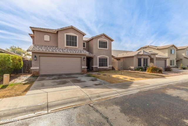 mediterranean / spanish-style house featuring a garage