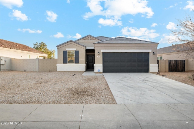 view of front of home with a garage