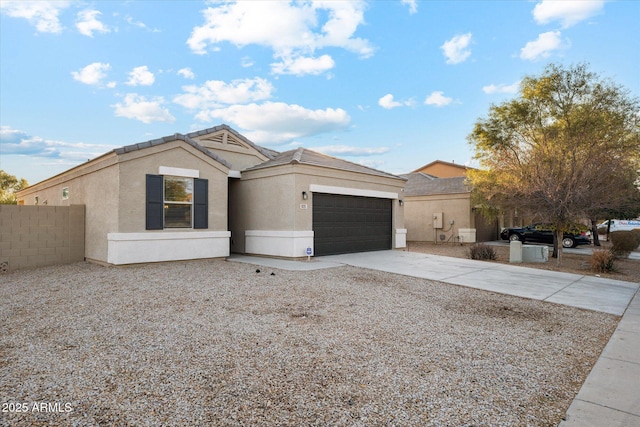 view of front of home with a garage