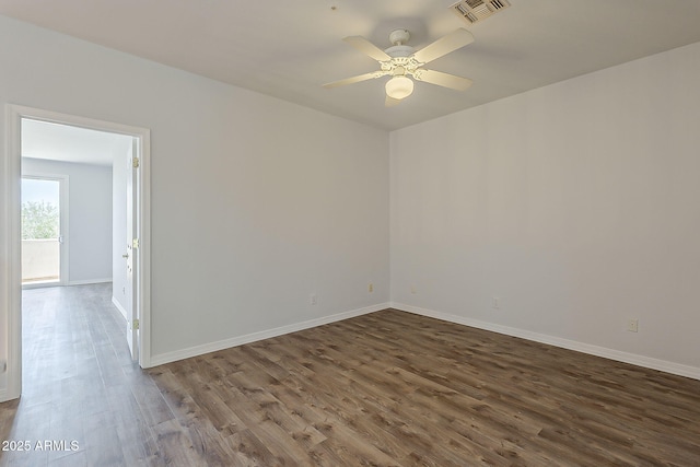 11752 N 135th Pl, Scottsdale, AZ 85259 - empty room featuring dark wood finished floors, visible vents, and baseboards