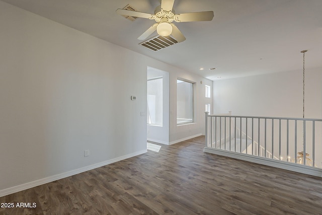 11752 N 135th Pl, Scottsdale, AZ 85259 - unfurnished room with recessed lighting, baseboards, a ceiling fan, and dark wood-style floors