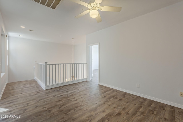 11752 N 135th Pl, Scottsdale, AZ 85259 - spare room with wood finished floors, visible vents, baseboards, and ceiling fan