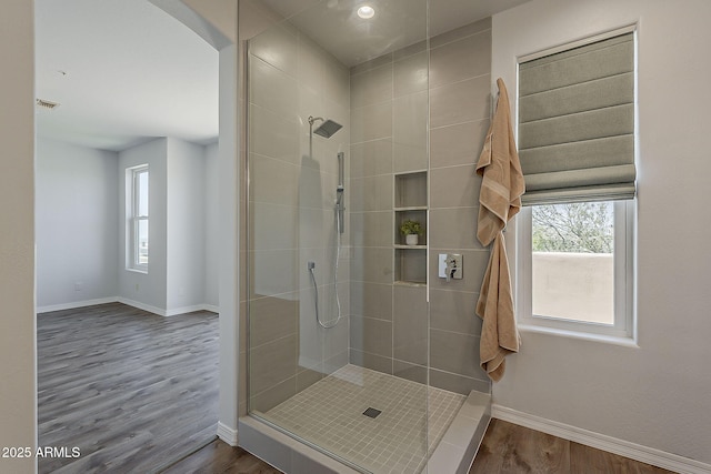 11752 N 135th Pl, Scottsdale, AZ 85259 - full bathroom featuring baseboards, visible vents, tiled shower, and wood finished floors