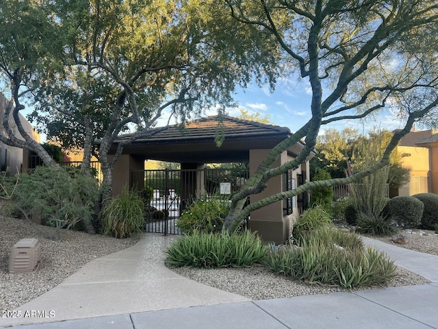 11752 N 135th Pl, Scottsdale, AZ 85259 - view of property's community with a gate and fence