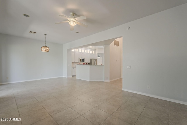 11752 N 135th Pl, Scottsdale, AZ 85259 - unfurnished living room with baseboards, visible vents, ceiling fan, and light tile patterned flooring