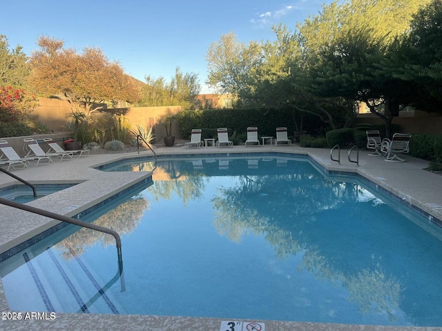 11752 N 135th Pl, Scottsdale, AZ 85259 - community pool featuring a patio area, a hot tub, and a fenced backyard