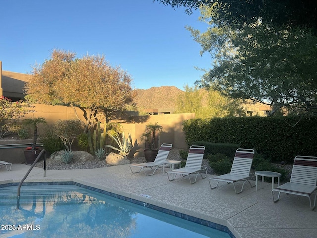 11752 N 135th Pl, Scottsdale, AZ 85259 - pool with a patio area, a fenced backyard, and a mountain view