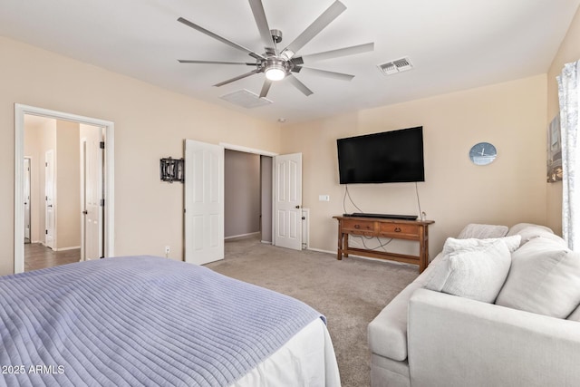 carpeted bedroom featuring ceiling fan