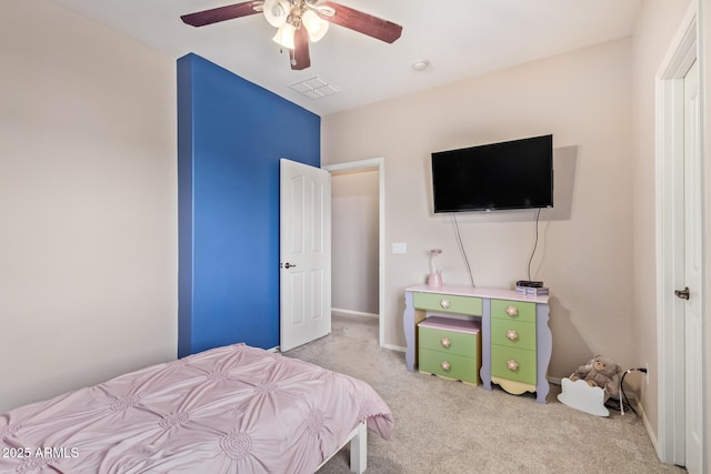 carpeted bedroom featuring ceiling fan