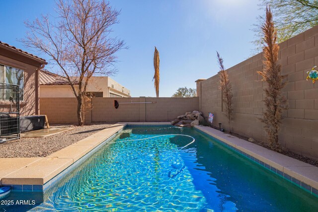 view of pool with central air condition unit