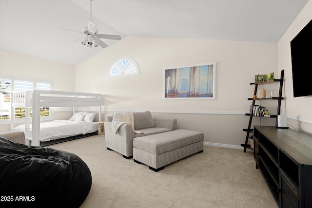 carpeted bedroom with lofted ceiling and ceiling fan