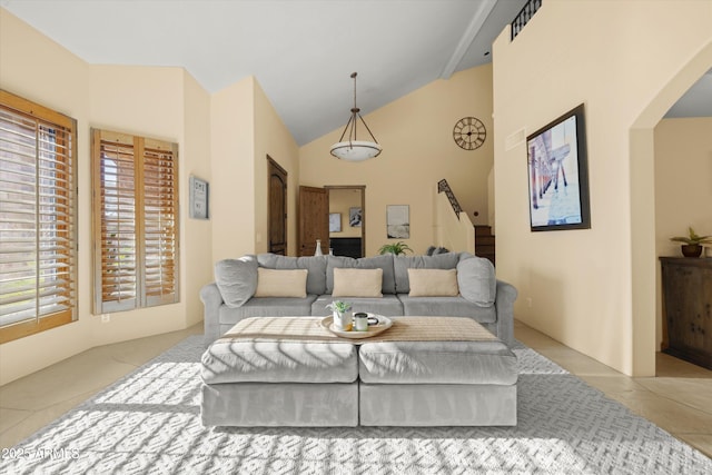 tiled living room featuring lofted ceiling