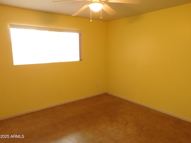 1019 E Granada Ave, Apache Junction, AZ 85119 - carpeted empty room featuring a ceiling fan and baseboards