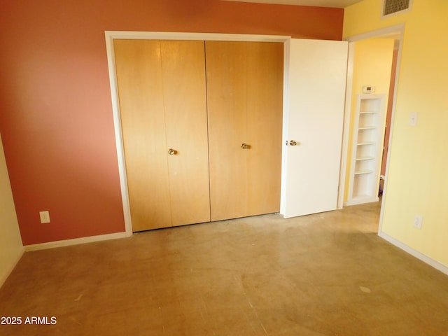 1019 E Granada Ave, Apache Junction, AZ 85119 - unfurnished bedroom featuring a closet and baseboards