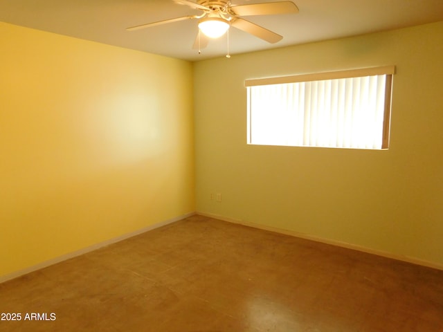 1019 E Granada Ave, Apache Junction, AZ 85119 - unfurnished room featuring plenty of natural light, a ceiling fan, and baseboards
