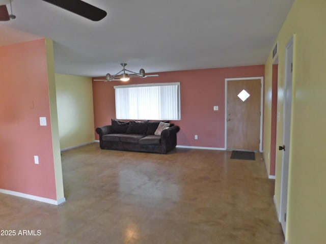 1019 E Granada Ave, Apache Junction, AZ 85119 - living area with a ceiling fan, baseboards, and finished concrete flooring