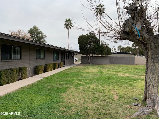 view of yard with fence