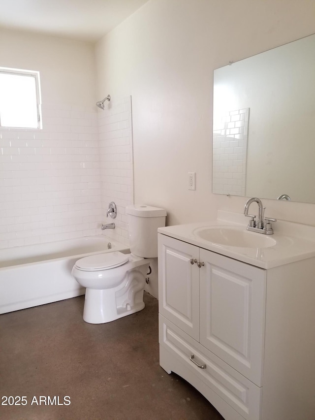bathroom featuring vanity, toilet, and tub / shower combination