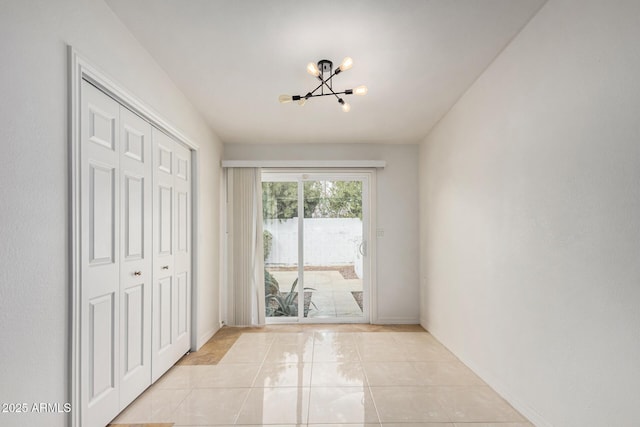 interior space with a chandelier