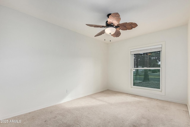 unfurnished room with light carpet and ceiling fan